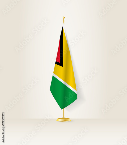 Guyana flag on a flag stand.