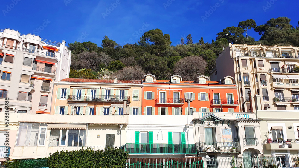 Naklejka premium view of buildings and architecture, walls and windows of Italian architecture in Nice in the south of France. Old city Cote d'Azur