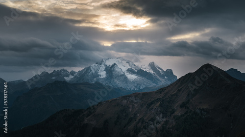 Sunset in the ranges and snow capped mountains of Dolomites  Italy