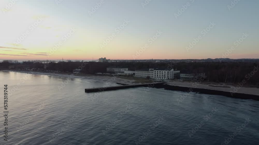 bathing bridge by the water with sunrise