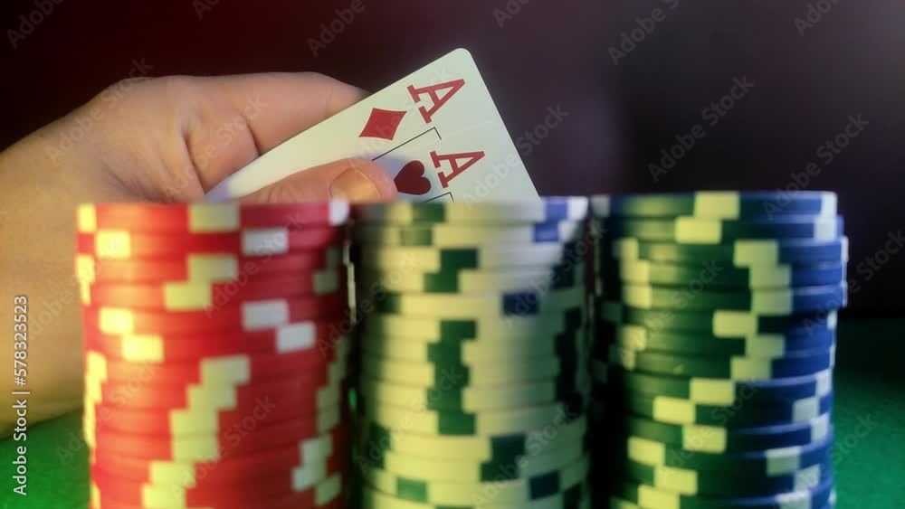 Poker chips and cards with two aces at the poker table Poker chips and cards with two aces at the poker table