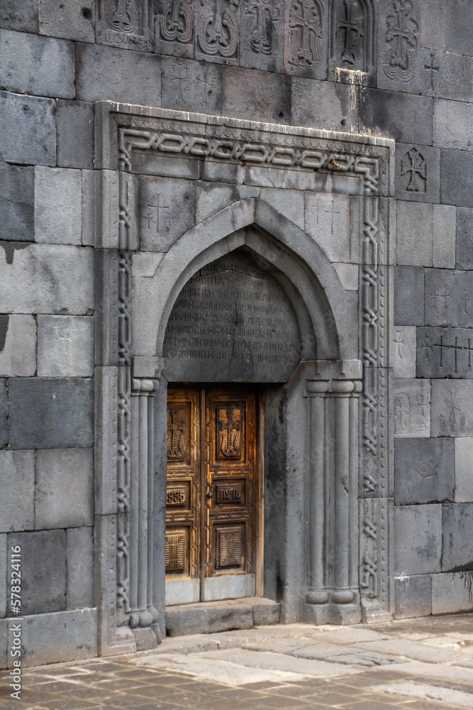 Monastery courtyard. Entrance to the church. Beautiful temple architecture Monastery courtyard. Entrance to the church. Beautiful temple architecture
