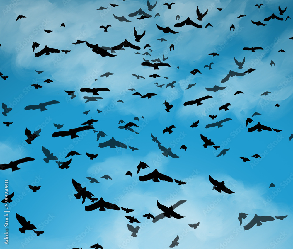 Fototapeta premium a flock of birds flying in the cloudy blue sky