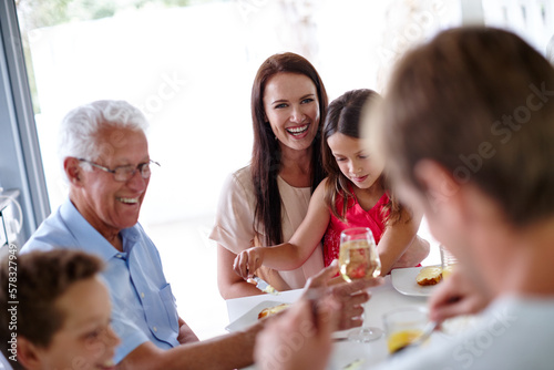Sharing a meal with loved ones. a multi-generational family having a meal together.