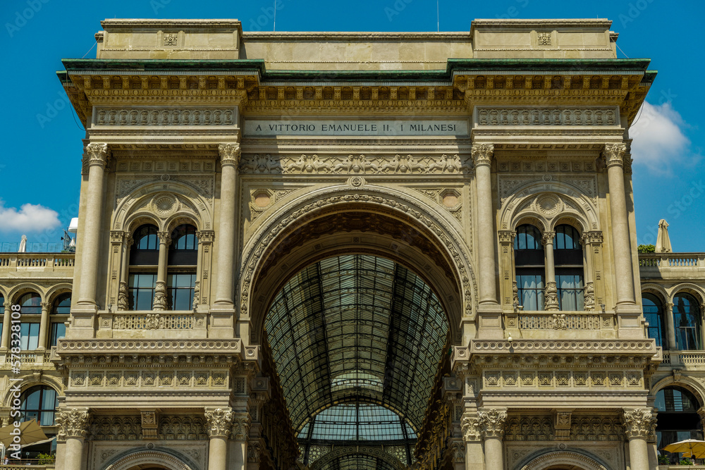 Milan, Italy Galleria Vittorio Emanuele II facade at Piazza del Duomo. Day view of historic mall entrance at Duomo square.