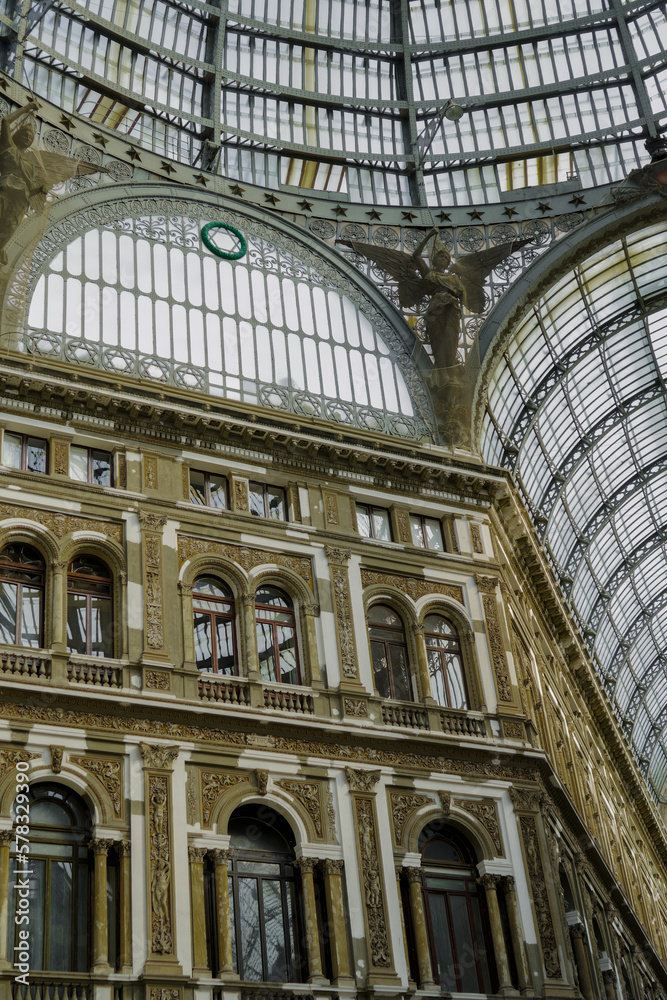 Naples, Italy inside Galleria Umberto I. Detail of glass-and-iron covered 19th century shopping gallery housing shops and cafes.