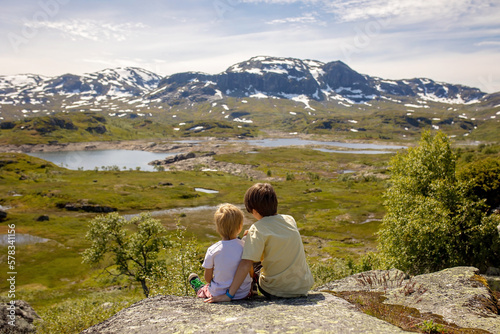 People, children enjoying the amazing views in Norway to fjords, mountains and other beautiful nature