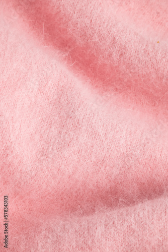 Close up of soft pink angora cloth, textile detail in pastel colors
