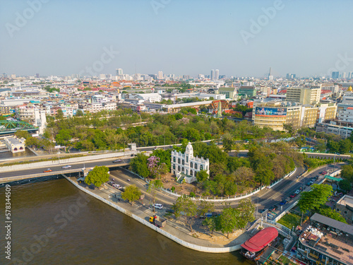 Aerial view city of Bangkok riverside with building and buddha temple