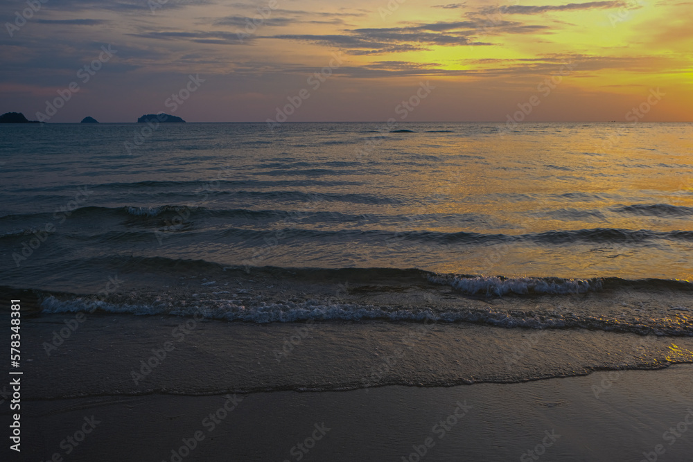Fototapeta premium sunset sea wave beach golden sky serenity nature landscapes