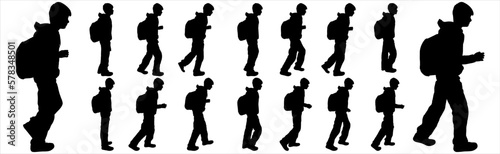 Black silhouette  schoolboy with a backpack. The student is standing. The boy takes a step. Children walk one after another. Go back to school. The idea of education. Backpack. Backpack. Side view.