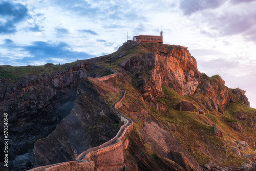 Basque country or Euskadi, Spain. San Juan de Gaztelugatxe island with church on the rock at sunrise