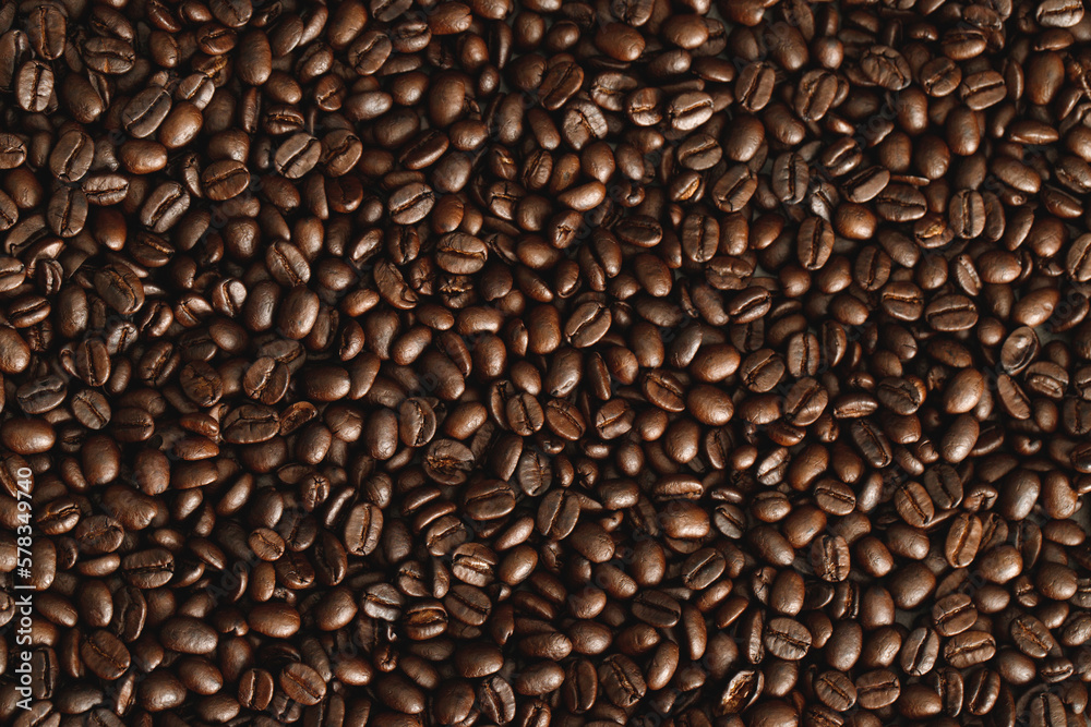 photo macro close up texture of roasted coffee beans dark, can be used as a background. photo macro close up texture of roasted coffee beans dark, can be used as a background.