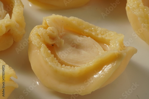 Close up of fresh abalone on a white plate