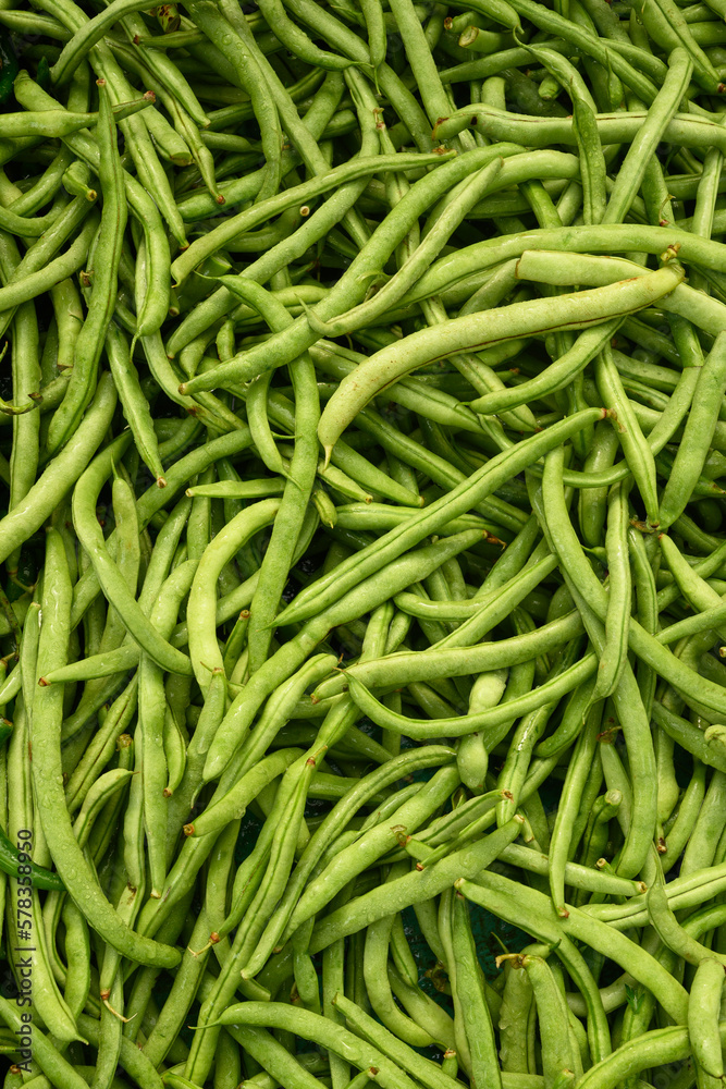 Fresh green bean on market as background. Top view. Organic texture. Local food and vegetables. Agriculture. Indonesian fresh harvest.