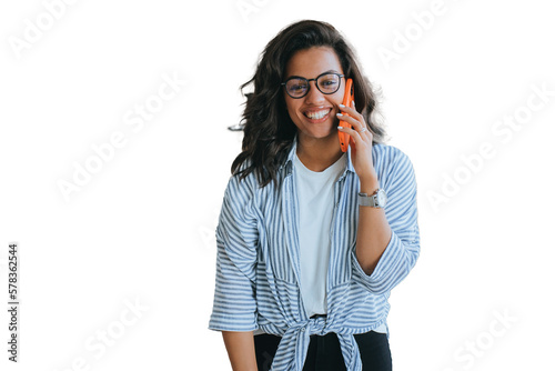 Happy African American girl in glasses, shirt and jeans talks by phone toothy smiles looks at camera excited speaks with boyfriend. Successful young female entrepreneur against transparent  background