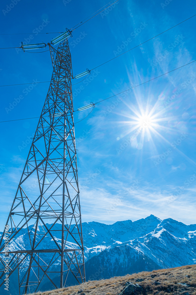 Electricity pylons, in a mountain place. Origin, transport and need for electricity. Environmental defacement. Eletricity grid. Electricity pylons, in a mountain place. Origin, transport and need for electricity. Environmental defacement. Eletricity grid.