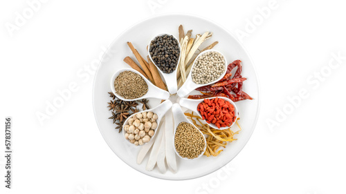 Noble herbs and spices on a spoon For cooking on white background. Asian food. Top view
