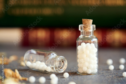A bottle of white homeopathic pills