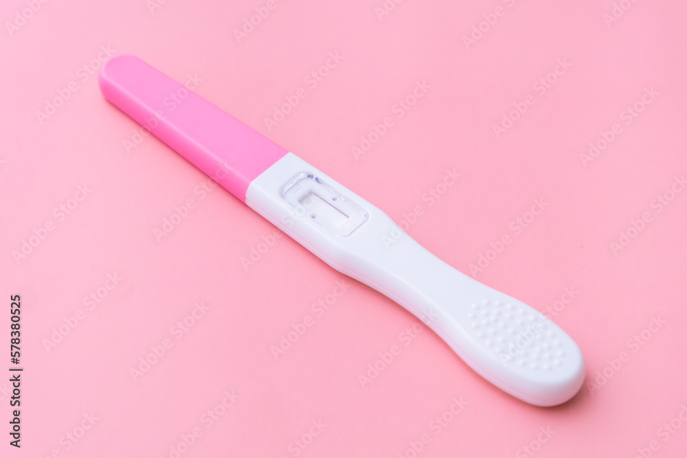 Pregnancy test isolated on the pink background. Pregnancy test isolated on the pink background.