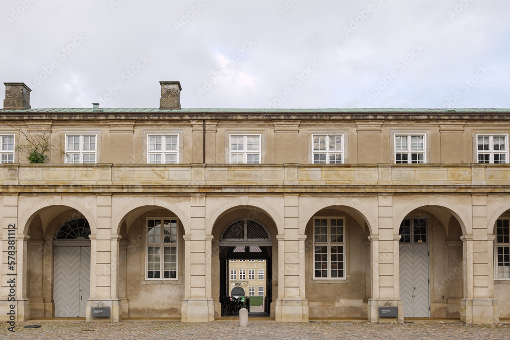 Obraz premium Outdoor exterior view and arch corridor of Christiansborg Palace in Copenhagen, Denmark.