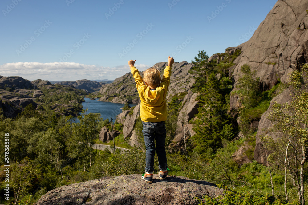 Naklejka premium Happy people, enjoying amazing views in South Norway coastline, fjords, lakes, beautiful nature