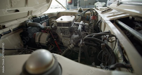 Wallpaper Mural Close-up of a car engine. The open hood of the car is ready for repair at the service station. High quality 4k footage Torontodigital.ca