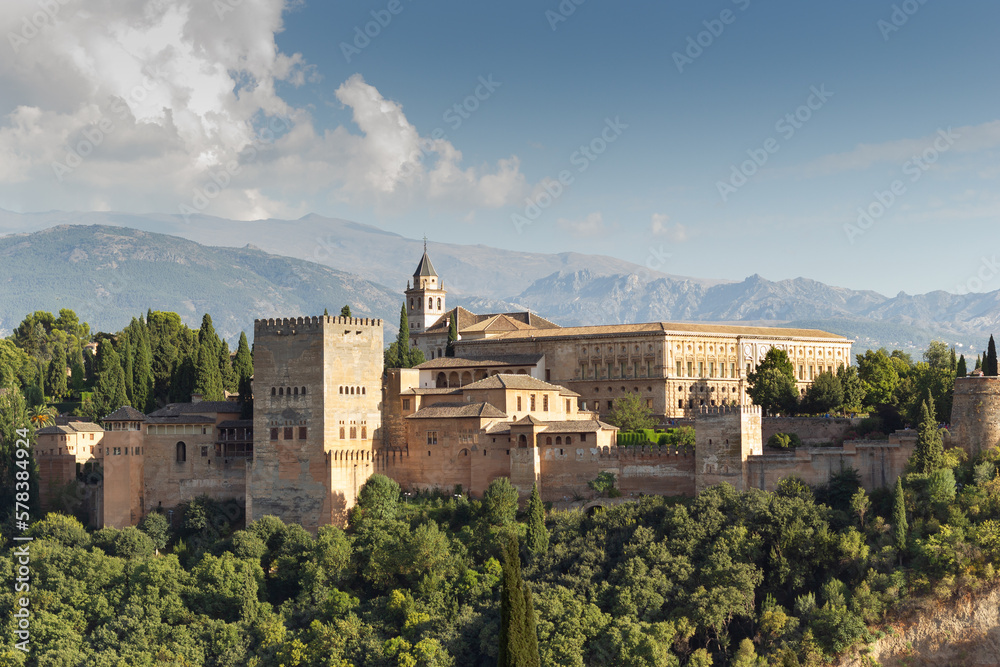 Panoramic view of the spectacular Alhambra in Granada, Andalusia, Spain, with Sierra Nevada in the background.