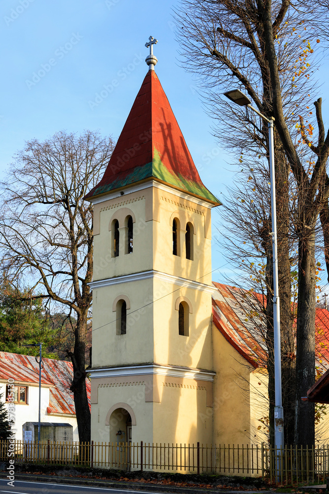CERVENY KLASTOR, SLOVAKIA - NOVEMBER 09, 2022: Small country church by the road.