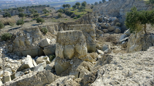 Türkiye earthquake, Major landslide in olive groves in Hatay due to fault rupture in the earthquake in Turkey. Aerial view of crushed clay blocks and rocks.