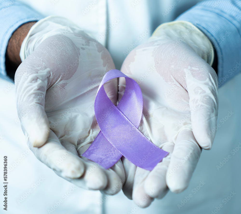 Fototapeta premium world purple day concept image, Doctor hand with Purple Ribbon Epilepsy Awareness day photo