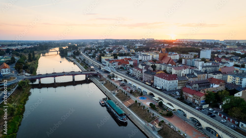 A beautiful drone photo was taken on a sunny day in Gorzów Wielkopolski, capturing the River Warta, the Cathedral, and the city center