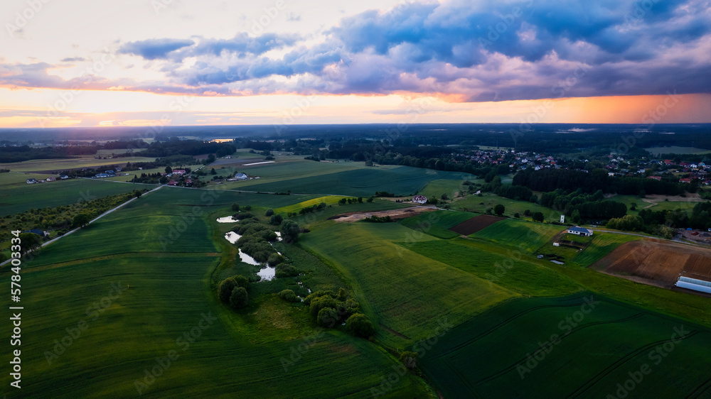 A stunning sunset aerial photo of fields in Poland near Gorzów Wlkp, captured by a drone