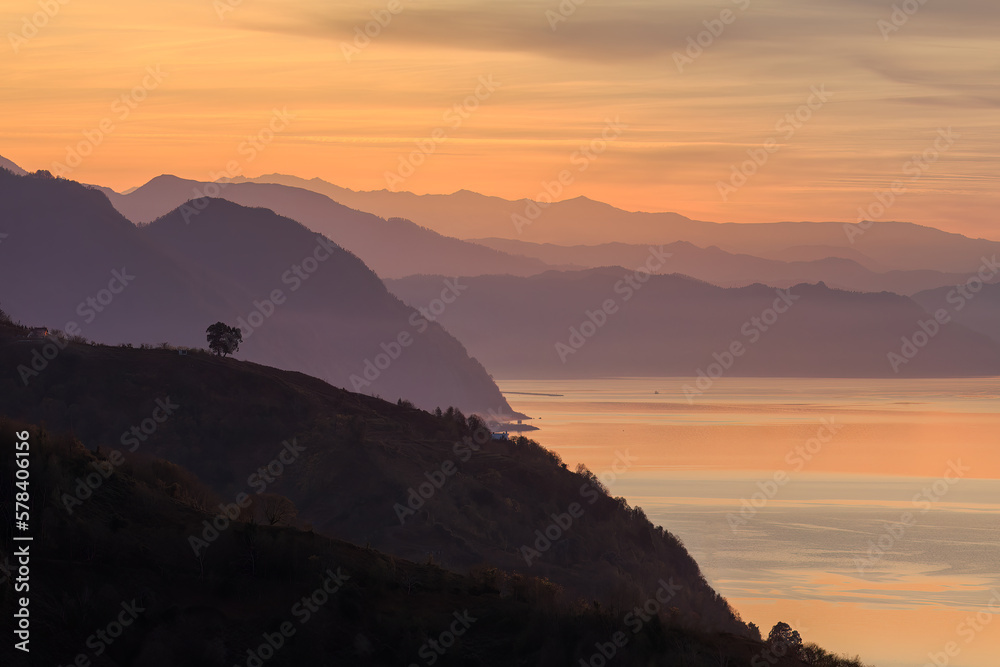 coast of the black sea in turkey at sunset, mountain ranges stretching into the distance