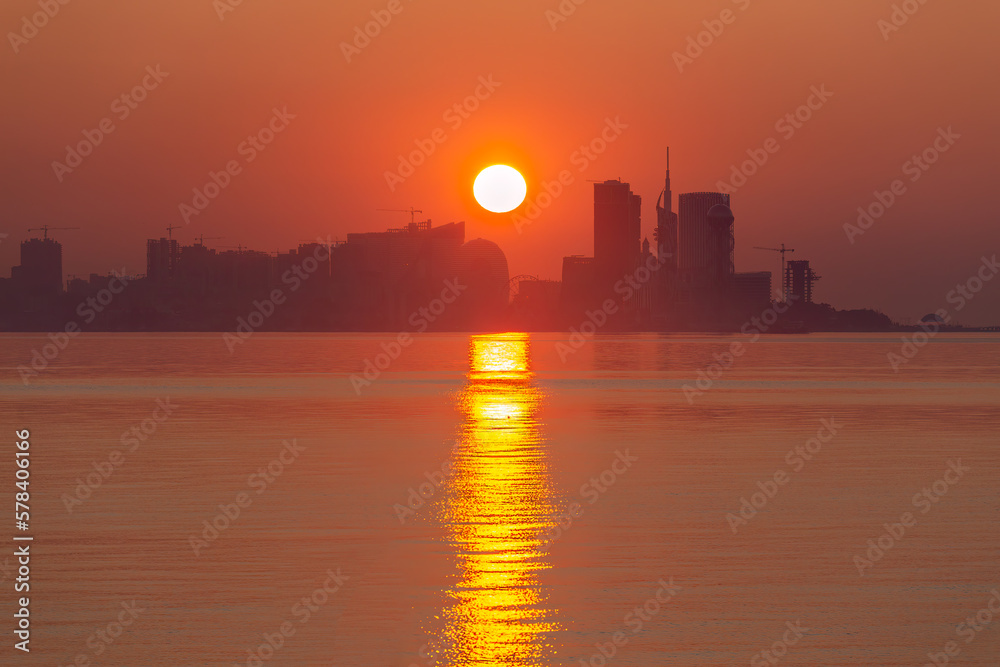 the sun sets outside the city, Batumi skyscrapers