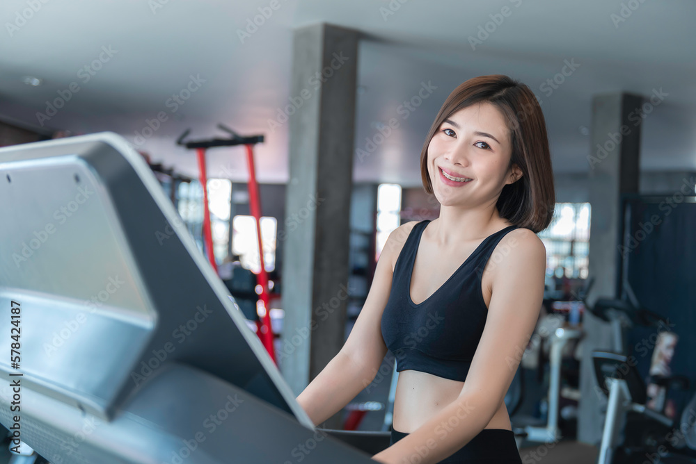 Beautiful asian woman play fitness in the gym,Thailand girl has a slim body,Time for exercise,People love heath,Stretching body before workout,Sport woman warm up body,push up with dumbell Beautiful asian woman play fitness in the gym,Thailand girl has a slim body,Time for exercise,People love heath,Stretching body before workout,Sport woman warm up body,push up with dumbell