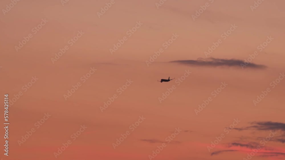 Commercial jet airplane departure, flies at sunset. Airplane in flight. Tourism and travel concept Commercial jet airplane departure, flies at sunset. Airplane in flight. Tourism and travel concept