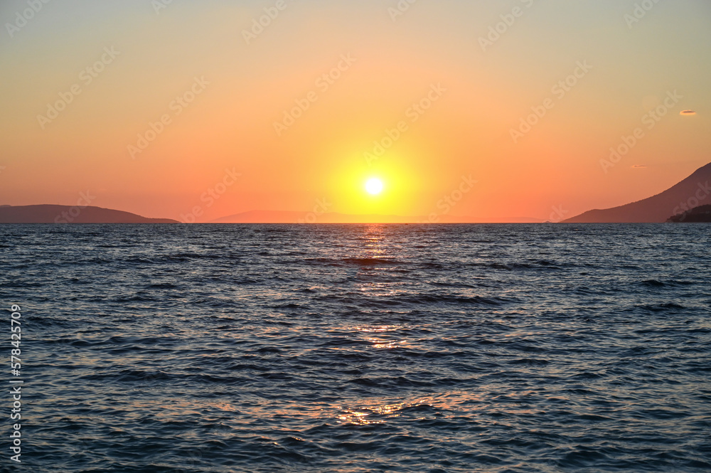 Beautiful sunset at the sea. Colorful sunset in summer. Beautiful sunset at the sea. Colorful sunset in summer.