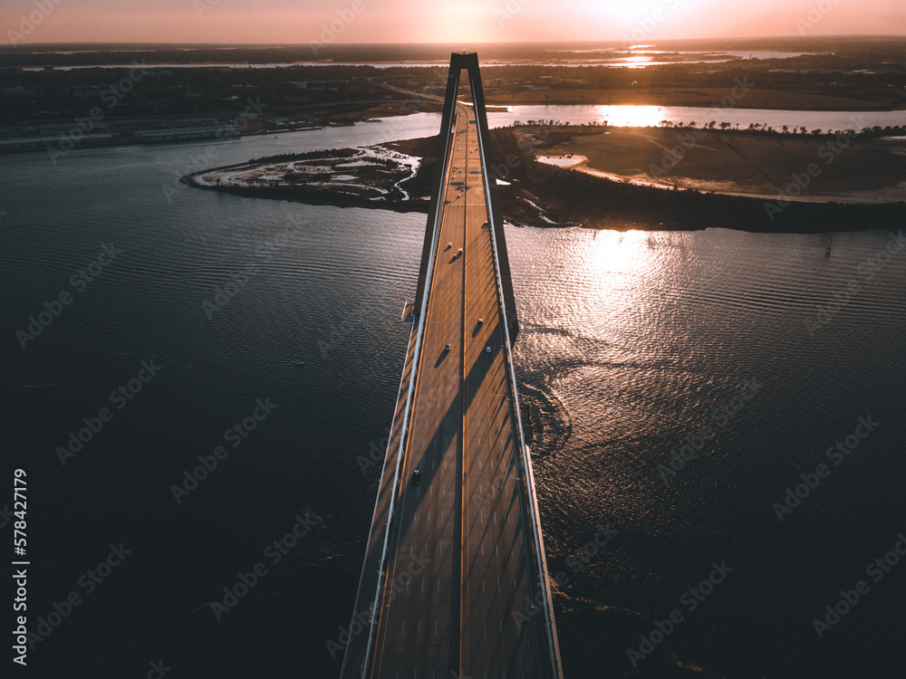 Fototapeta premium Aerial view of the Arthur Ravenel Jr. Bridge during sunrise.