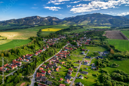 Beautiful view of Western Tatras mountains in Slovakia. Village Smrecany under and peak Baranec at background. photo