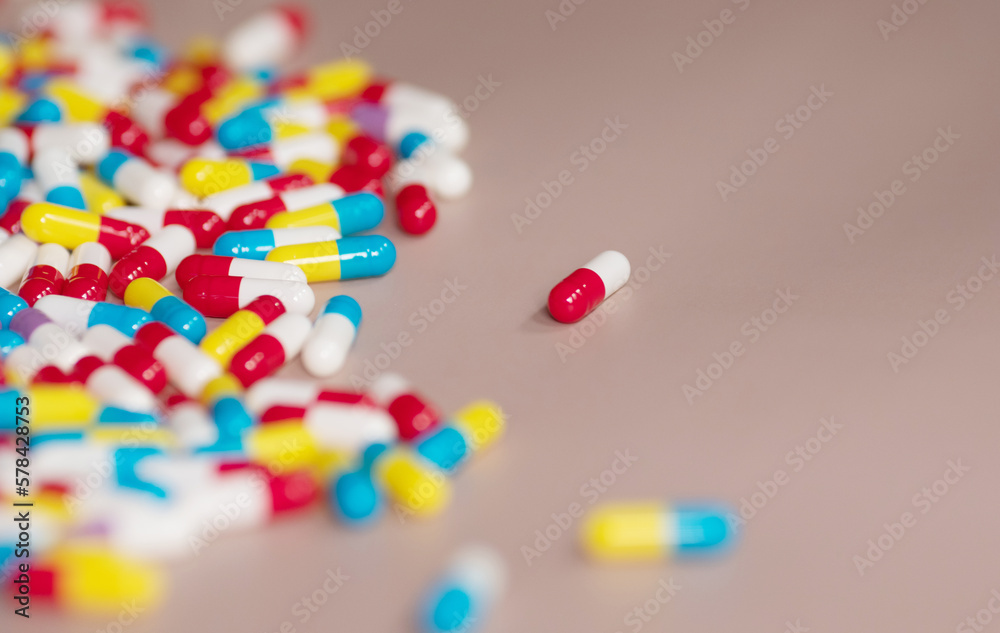 Different pills on beige background, flat lay. Different pills on beige background, flat lay.