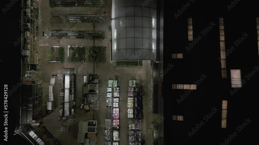 Night aerial view of an industrial area racking and building supplies Night aerial view of an industrial area racking and building supplies