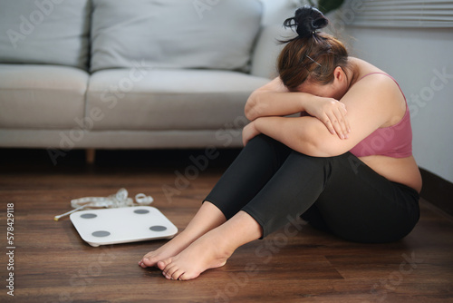 Depressed sadness overweight woman failure in weight loss..