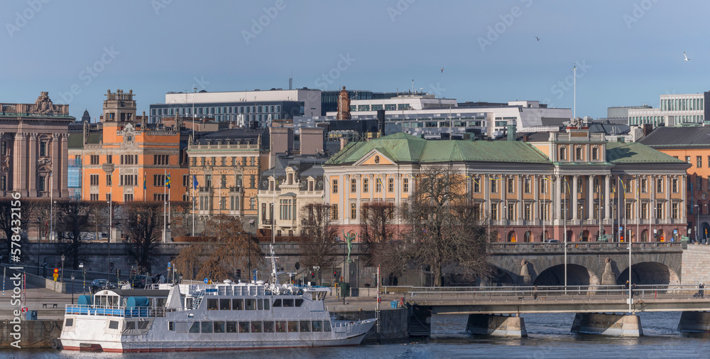 Panorama. The bay Strömmen, commuter boat, bridge, Department of Foreign Affairs, the Prime minister building Sagerska Palatset, a sunny spring day in Stockholm