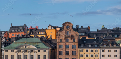 Panorma. Roofs and facades in the old town Gamla Stan, a sunny spring day in Stockholm