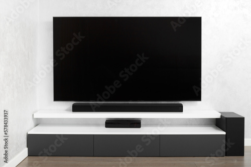 Modern living-room with TV and hifi equipment Sound bar