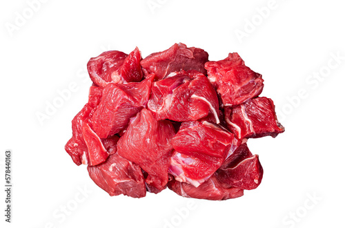Raw diced red beef meat for Goulash on marble board.  Isolated, transparent background