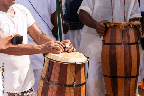 Принти на полотні candomble members are playing percussion instruments during the party for yemanj