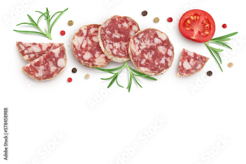 Cured salami sausage slices isolated on white background. Italian cuisine with full depth of field. Top view with copy space for your text. Flat lay.