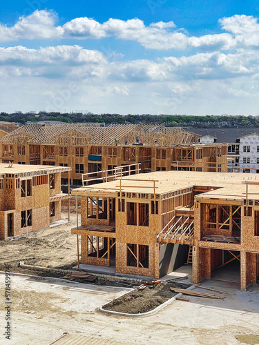 New Apartment Building Complex Progress: Workers Constructing the Roof - Vertical